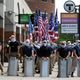 Marchers bearing insignias of the white supremacist group Patriot Front pause during a gathering on Saturday, July 2, 2022, in Boston.